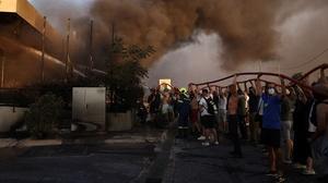 PBS NEWS : Wildfires Burn Around Athens After Drought