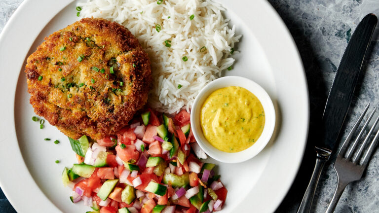 Cod Cake with Amba Sauce and Israeli Salad