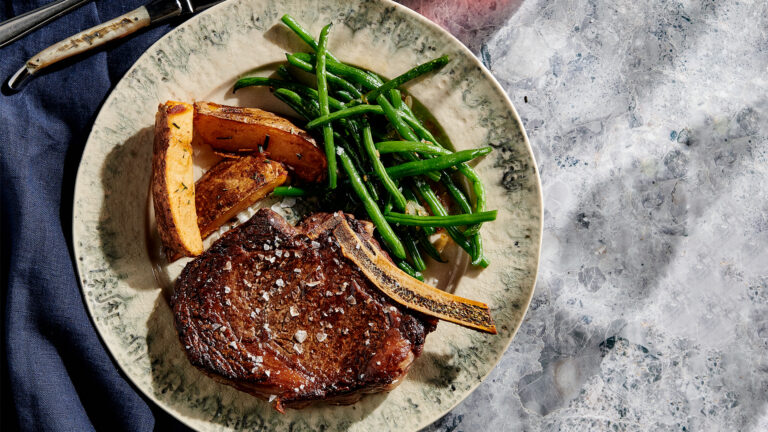 Dry-Aged Rib Steak with Fried Potato Wedges and String Beans
